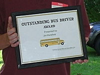 Steve Botsford Presents Jim Mansfield with Honorary Bus Driver Award, July 2011